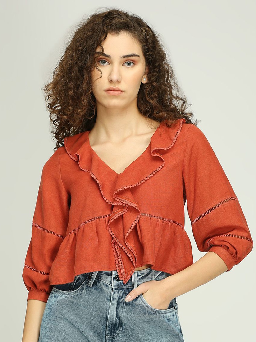 

IZEL Women Puff Sleeve Peplum Crop Top, Rust