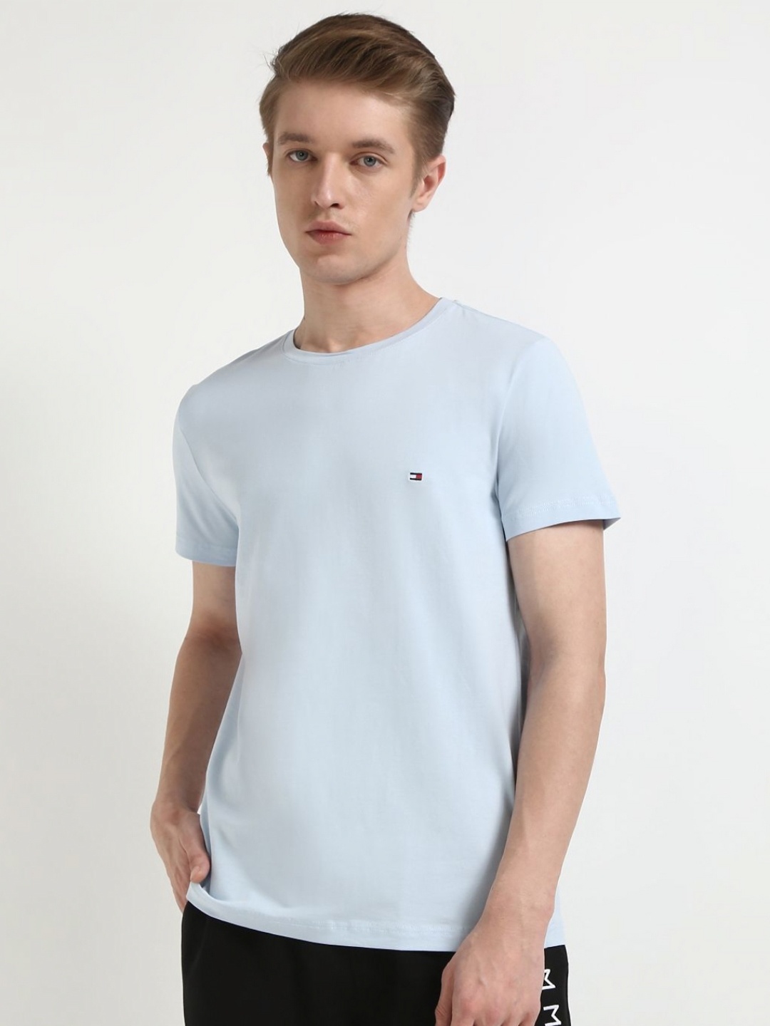 

Tommy Hilfiger Men Solid Slim Fit Cotton T-shirt, Blue