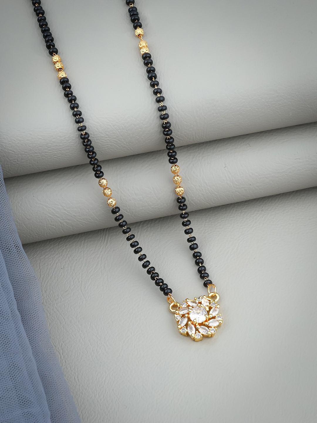 

Wynona Gold-Plated American Diamond Stone Studded & Beaded Mangalsutra