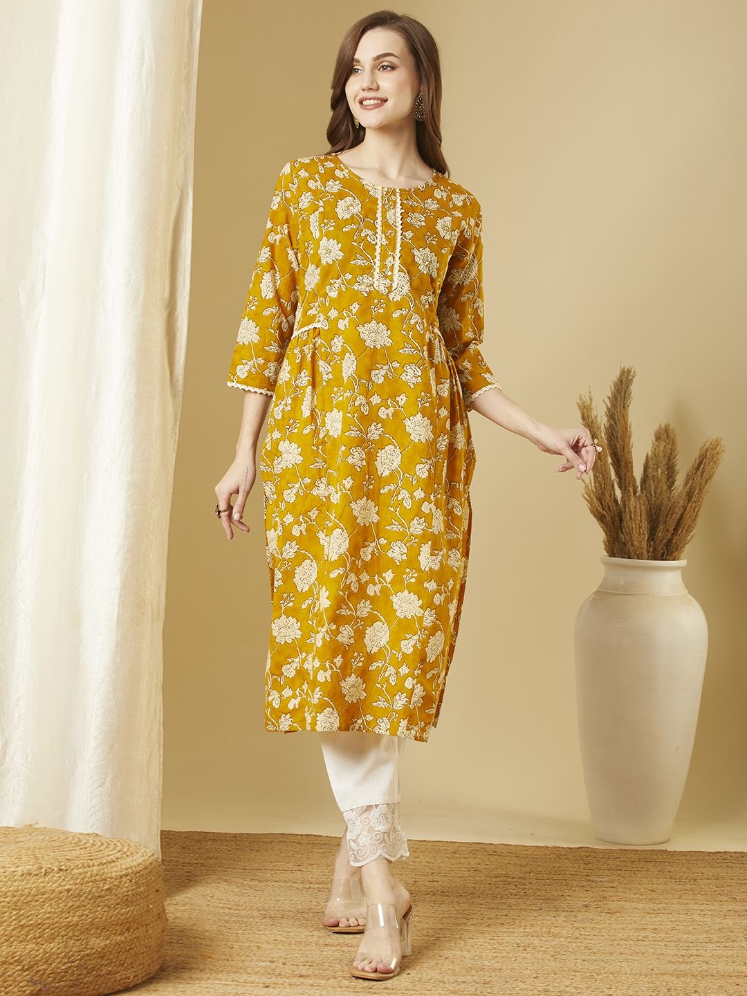 

FASHOR Floral Printed Round Neck Mirror Work Pure Cotton A-Line Kurta, Mustard