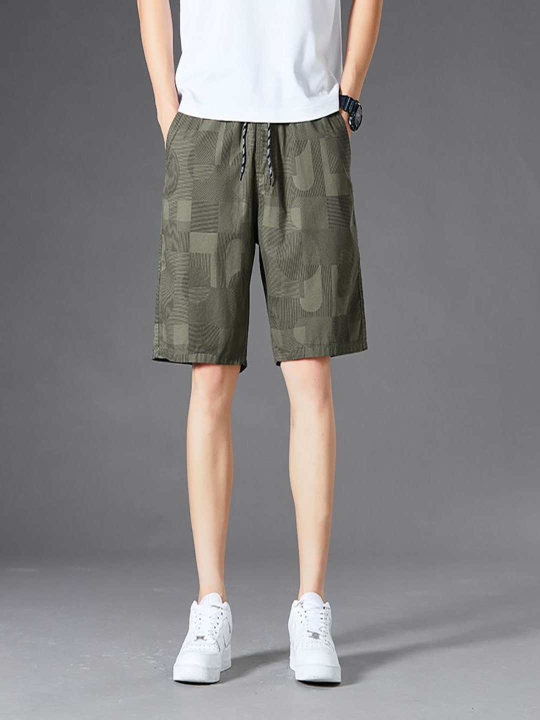 

StyleCast x Revolte Men Printed Regular Fit Mid-Rise Cotton Shorts, Green