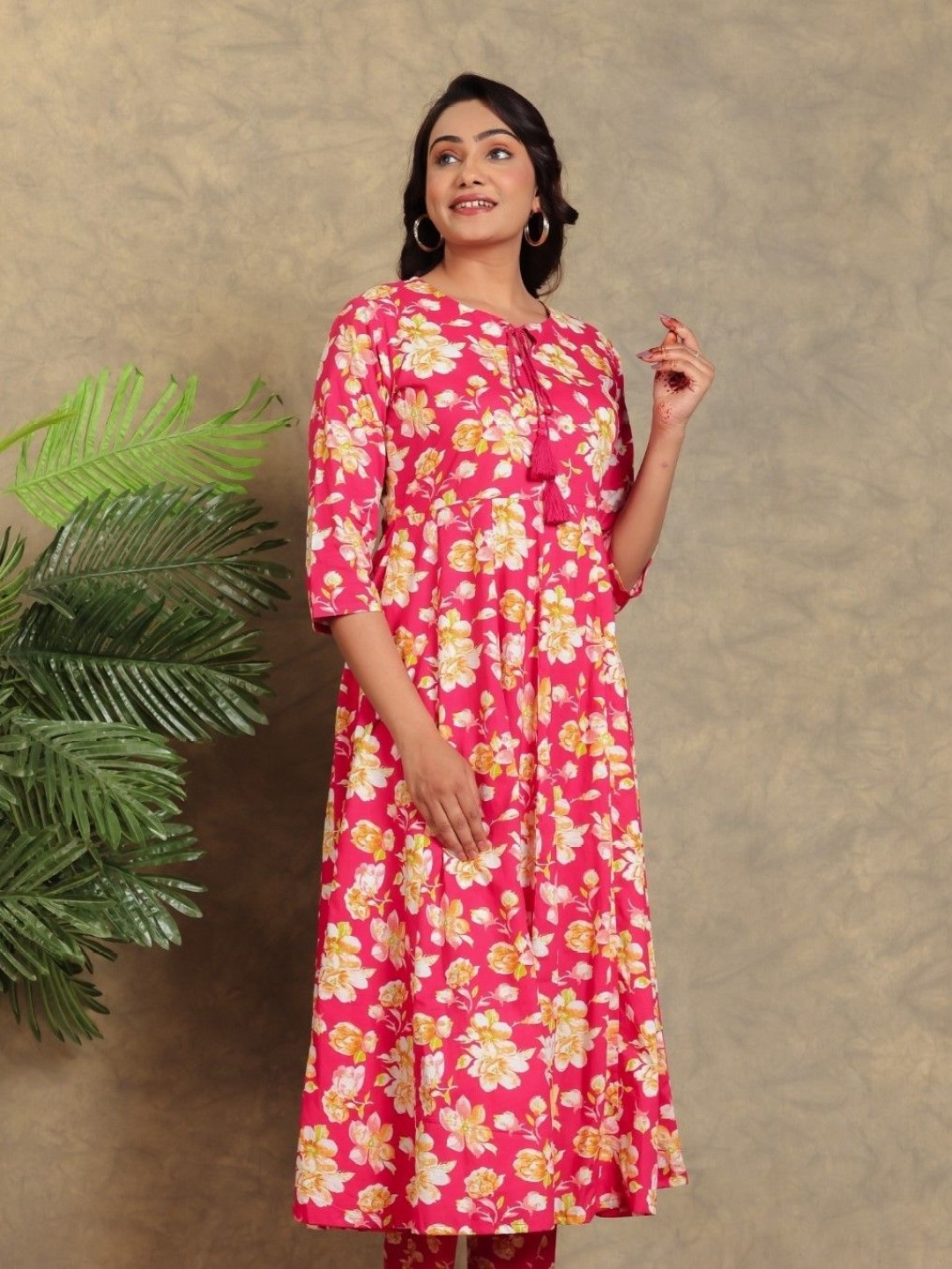 

Aramya Floral Printed Tie Up Neck Cotton Anarkali Flared Kurta, Pink