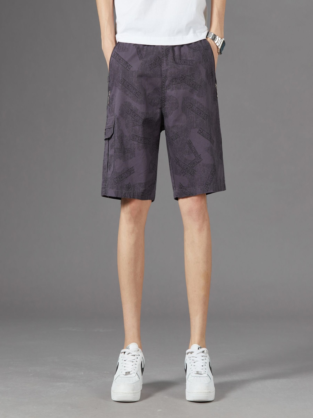 

StyleCast x Revolte Men Printed Mid-Rise Cotton Shorts, Grey