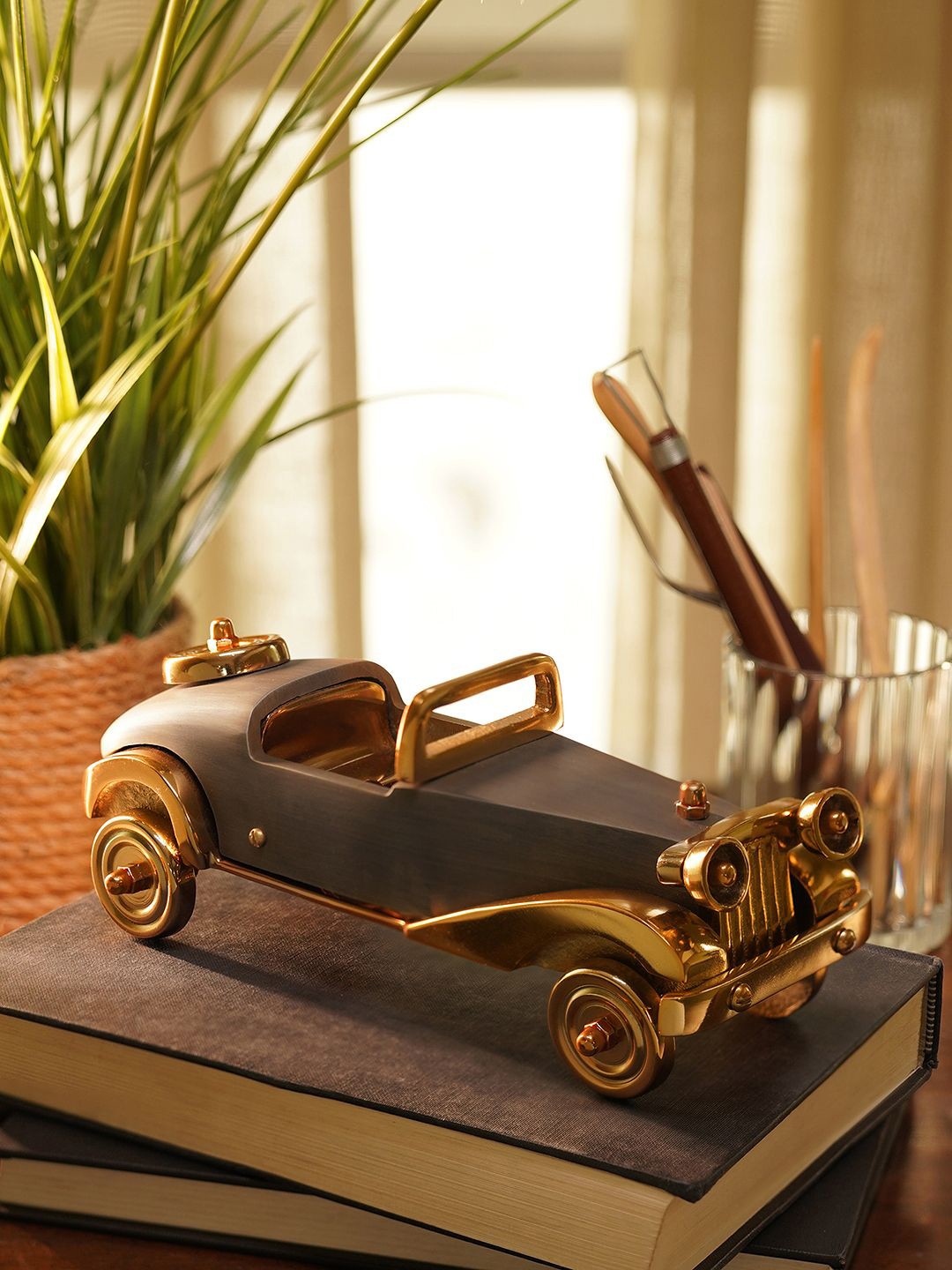 

Pure Home and Living Gold-Toned & Grey Decorative Car Showpiece