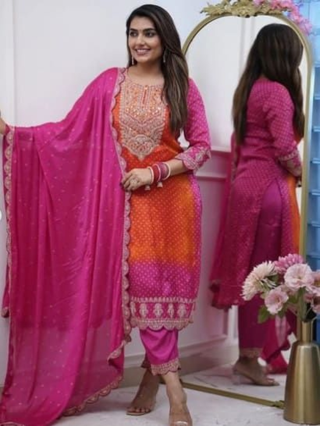 

Shriji fashion Bandhani Printed Zardozi work Round Neck Kurta With Trouser & Dupatta, Orange