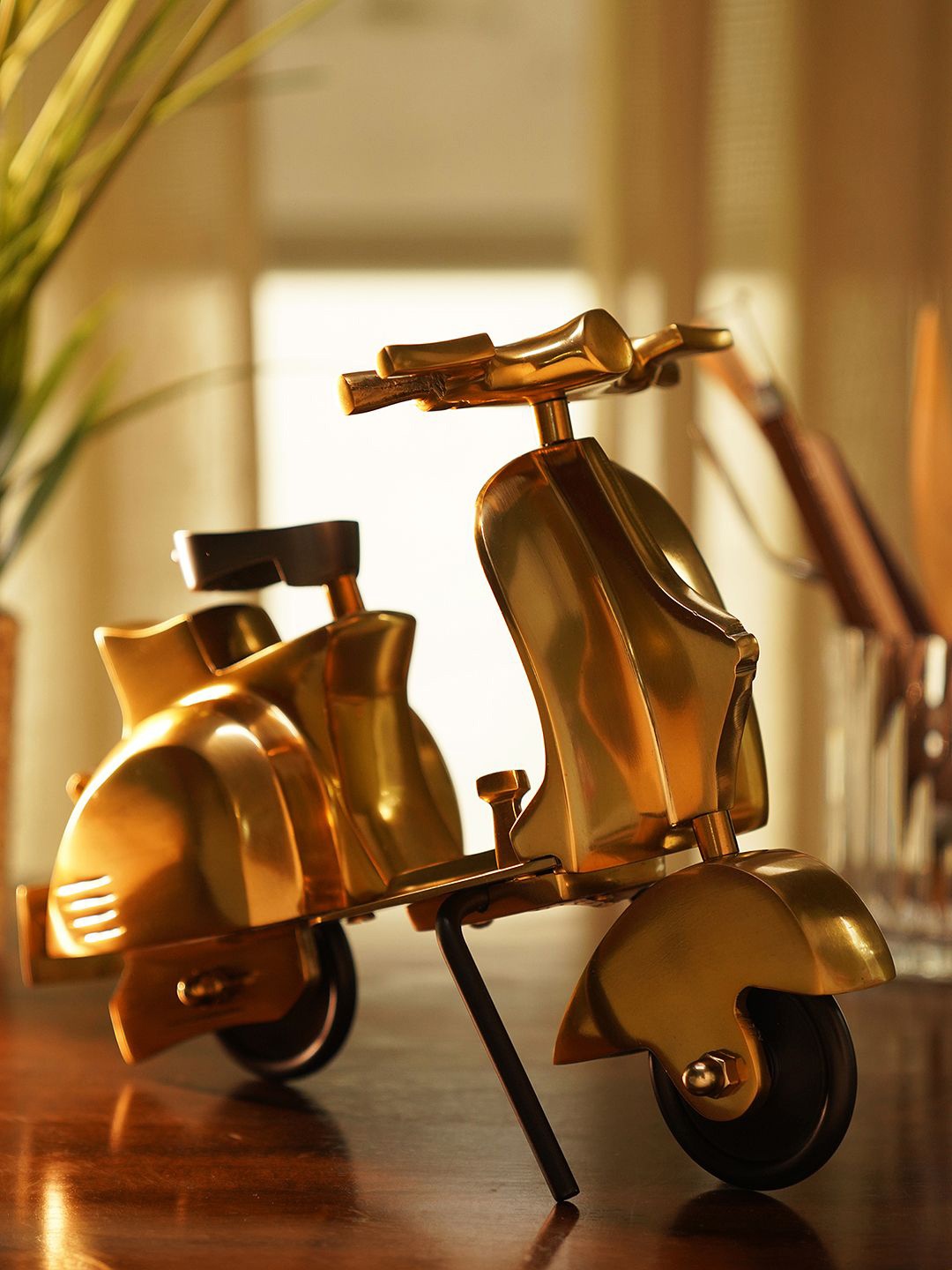 

Pure Home and Living Gold-Toned & Black Decorative Scooter Showpiece