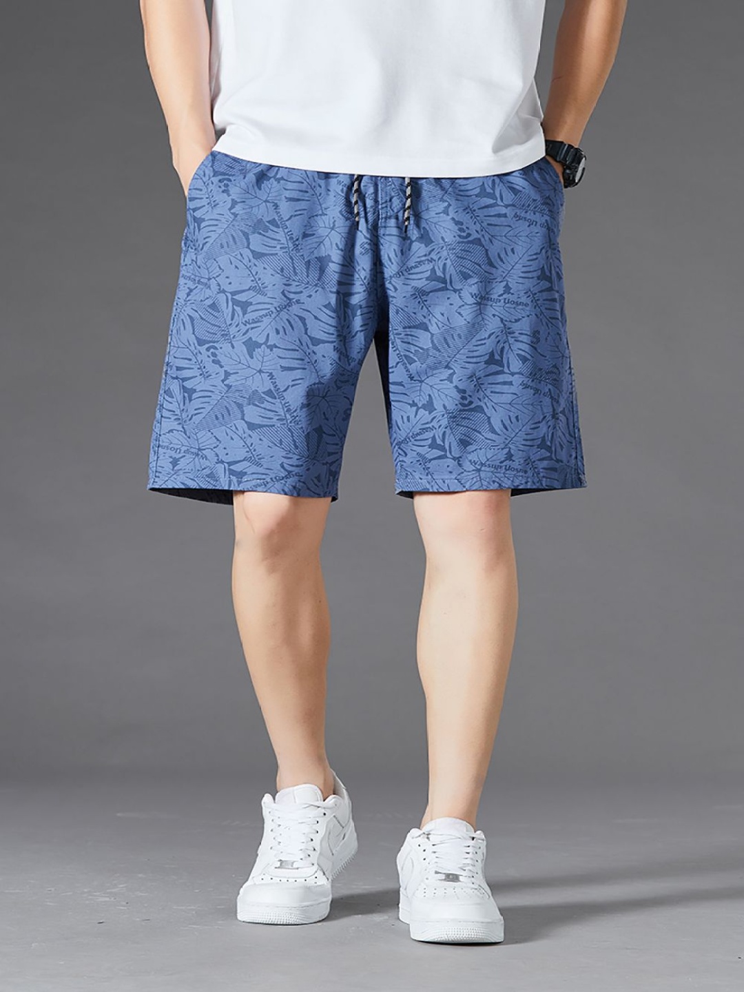 

StyleCast x Revolte Men Conversational Printed Cotton Shorts, Blue