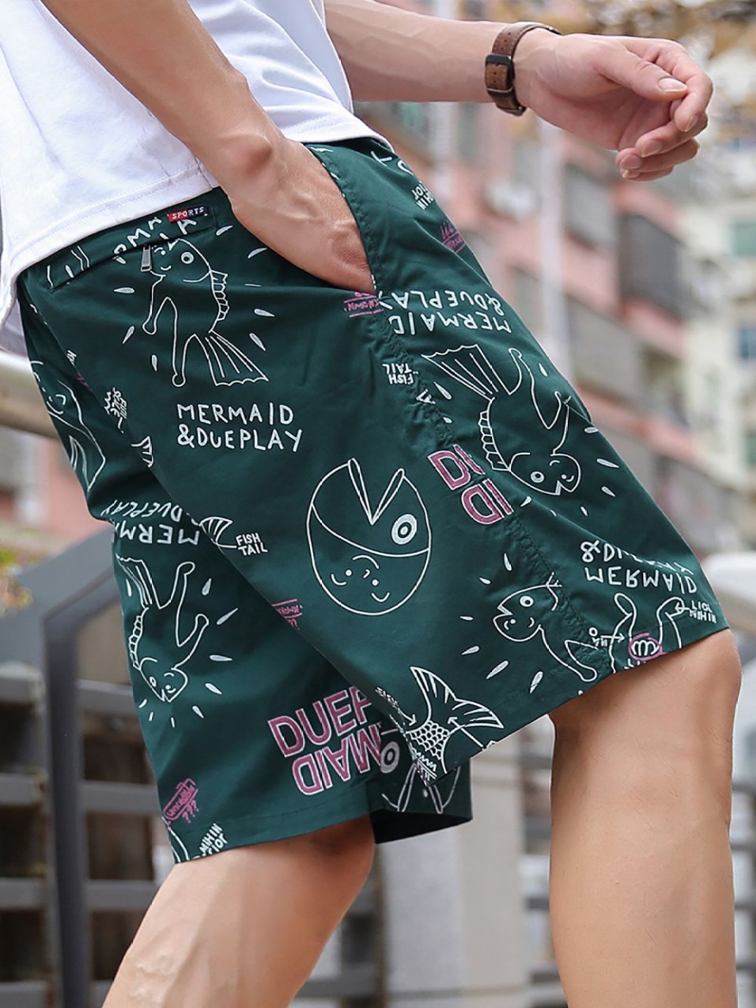 

StyleCast x Revolte Men Printed Cotton Shorts, Green