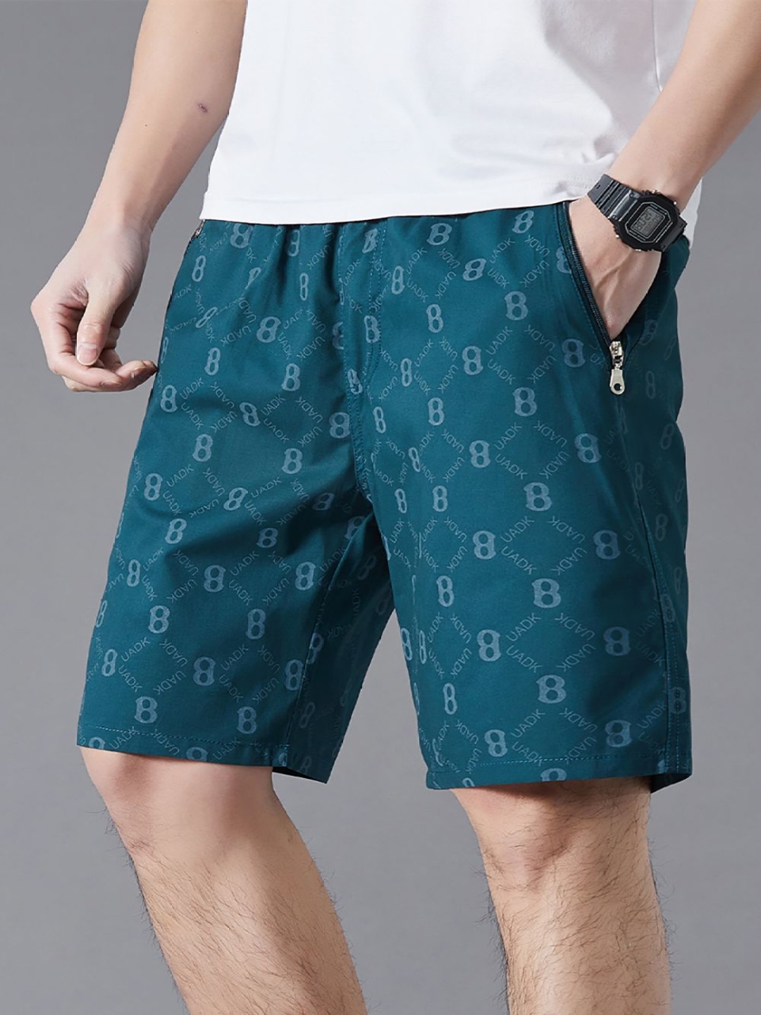 

StyleCast x Revolte Men Printed Cotton Shorts, Green