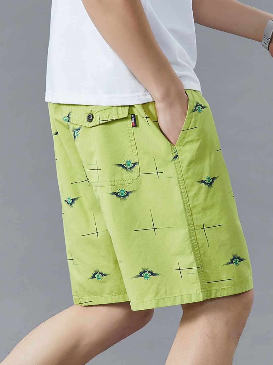 

StyleCast x Revolte Men Conversational Printed Shorts, Lime green