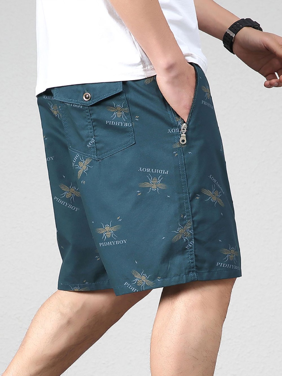 

StyleCast x Revolte Men Printed Mid-Rise Regular Cotton Shorts, Green