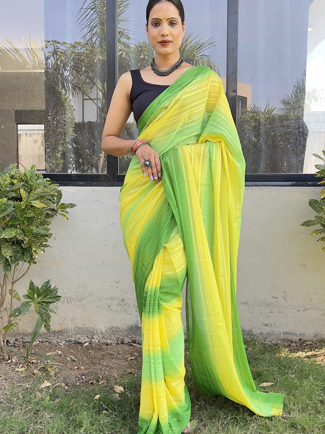 

DIVASTRI Women Striped Pure Chiffon Saree, Yellow