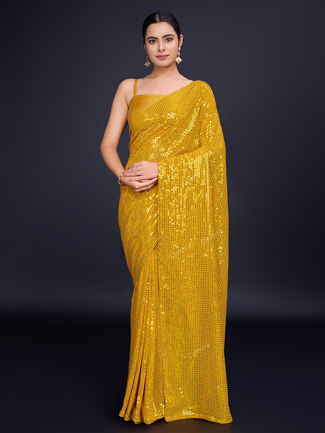 

FashionsEye Embellished Sequinned Pure Georgette Saree, Mustard