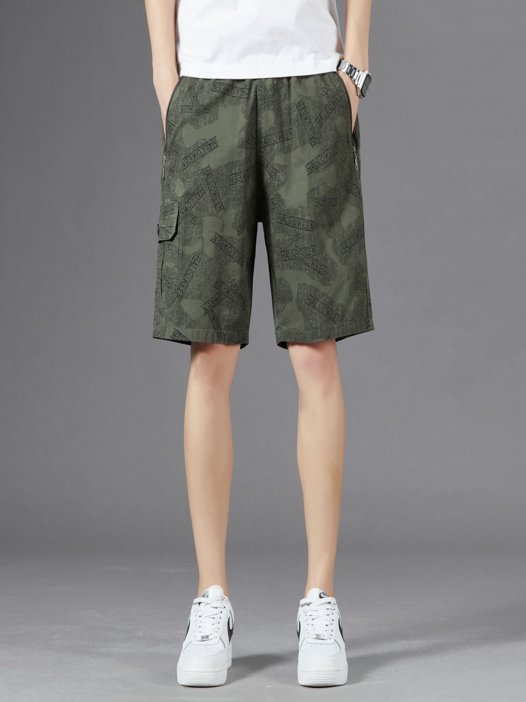 

StyleCast x Revolte Men Printed Cotton Shorts, Green