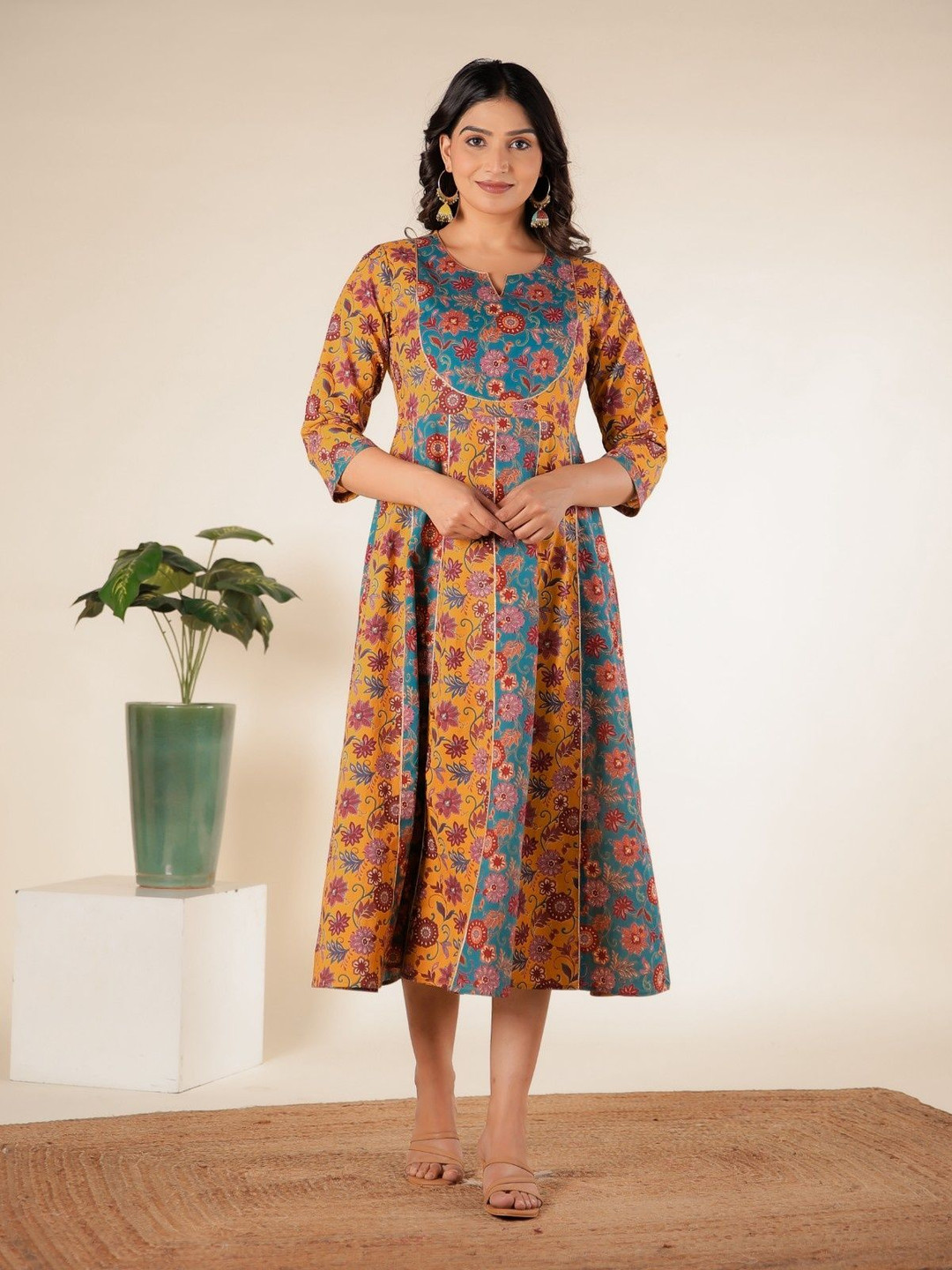 

Aramya Floral Printed Notch Neck A-Line Cotton Ethnic Dress, Mustard