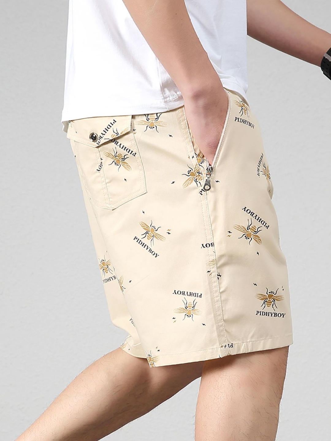 

StyleCast x Revolte Men Printed Mid-Rise Cotton Regular Shorts, Khaki