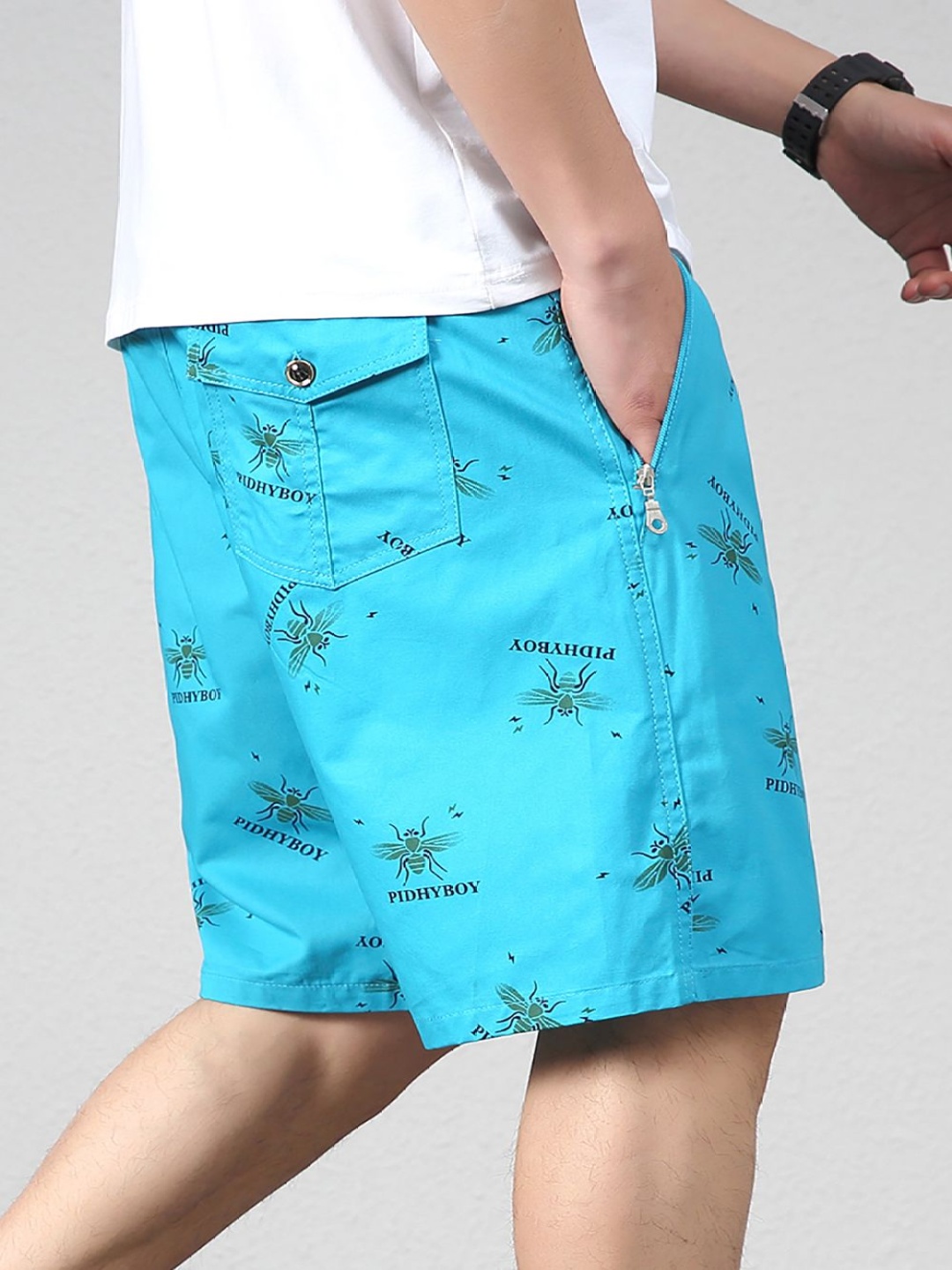 

StyleCast x Revolte Men Cotton Printed Mid-Rise Regular Shorts, Blue