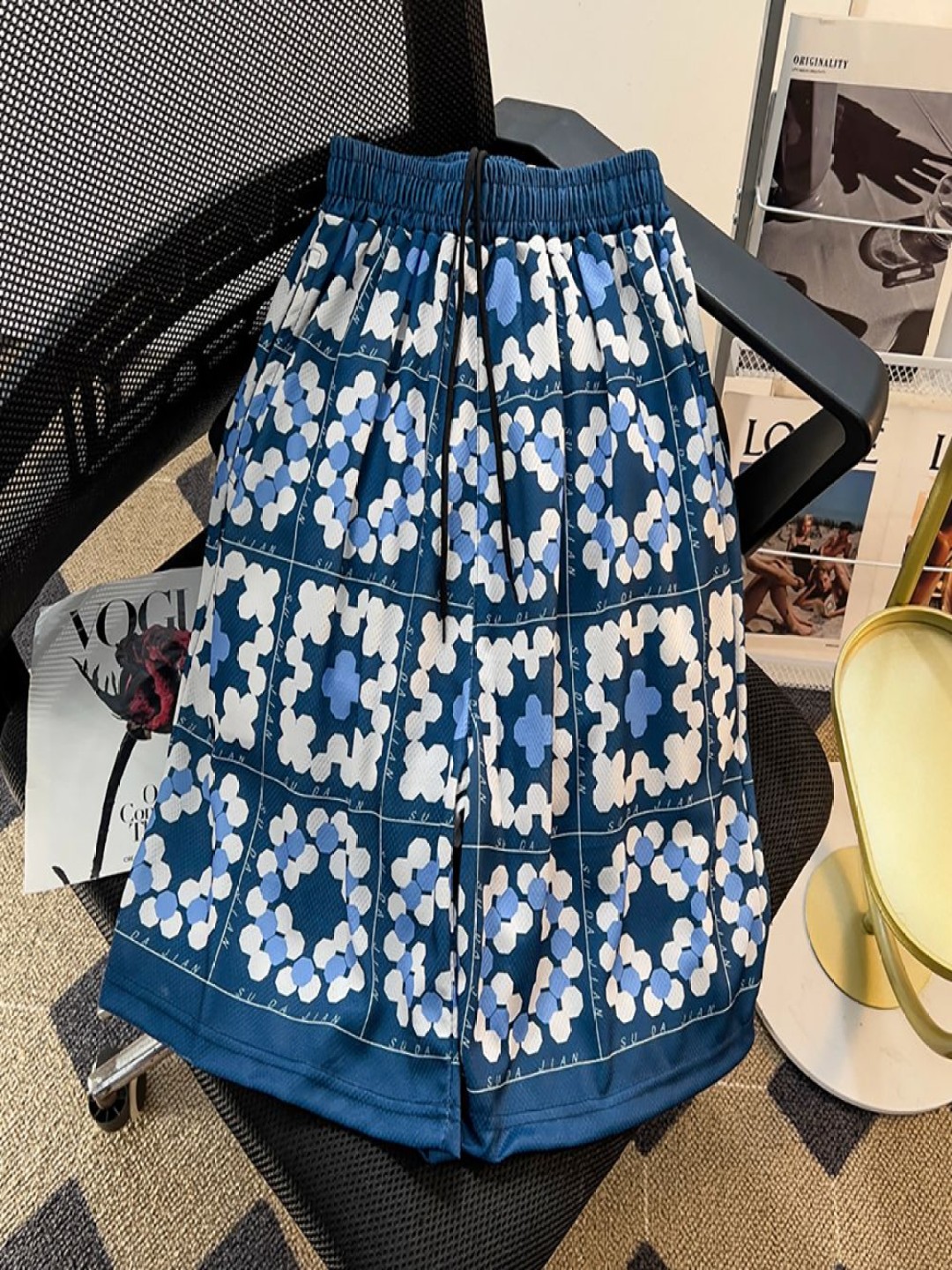 

StyleCast x Revolte Men Floral Printed Mid-Rise Regular Fit Cotton Shorts, Blue