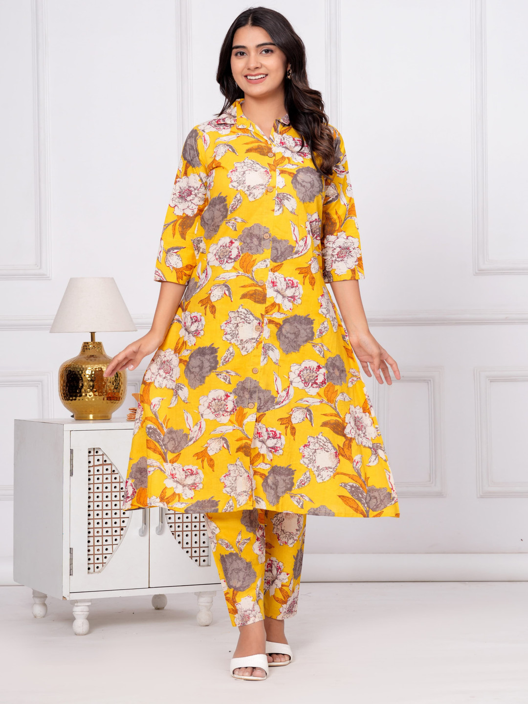 

AARYAHI Floral Printed Shirt Collar Pure Cotton A-Line Kurta With Trouser, Mustard