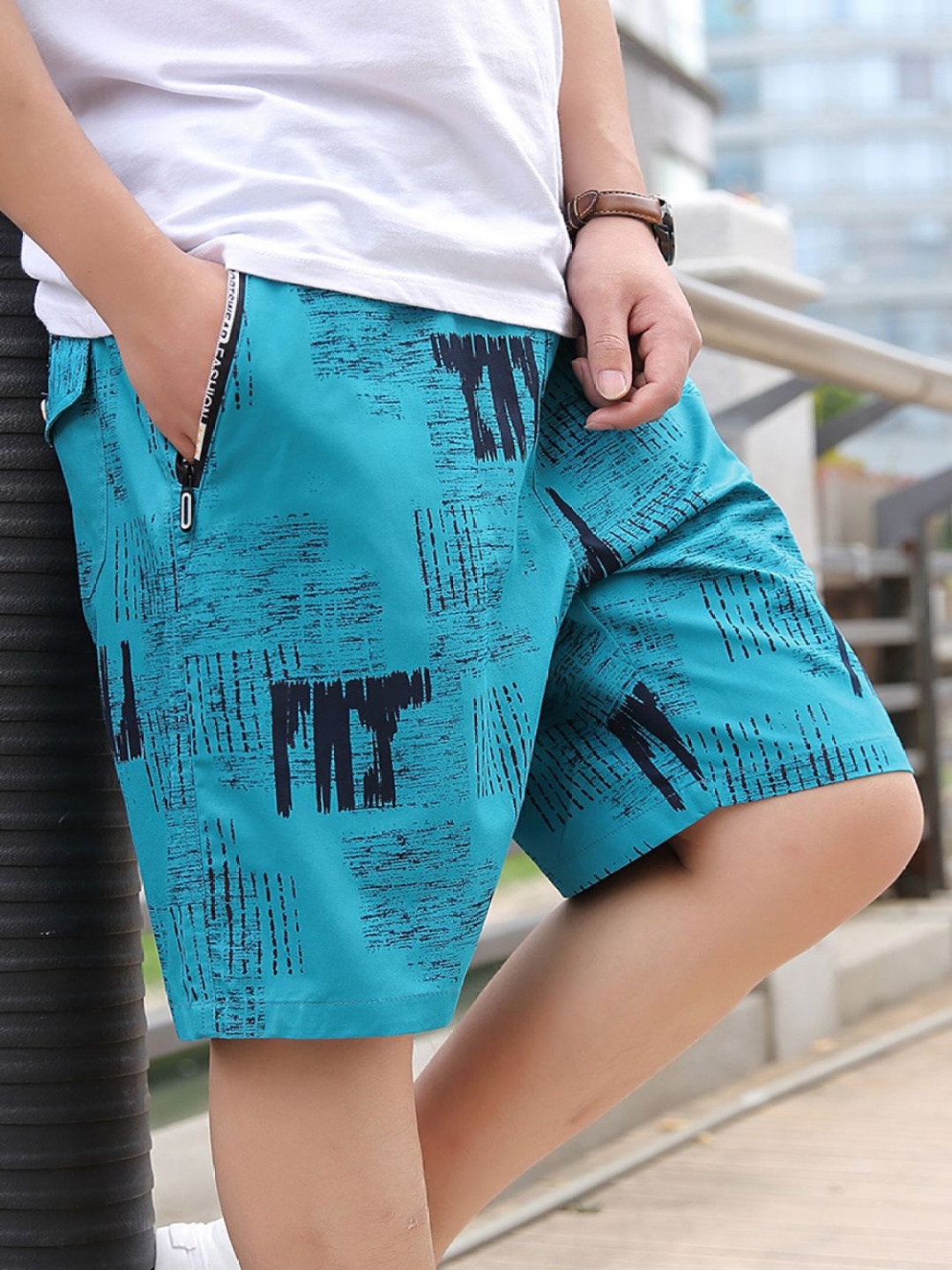 

StyleCast x Revolte Men Printed Mid-Rise Cotton Regular Shorts, Blue
