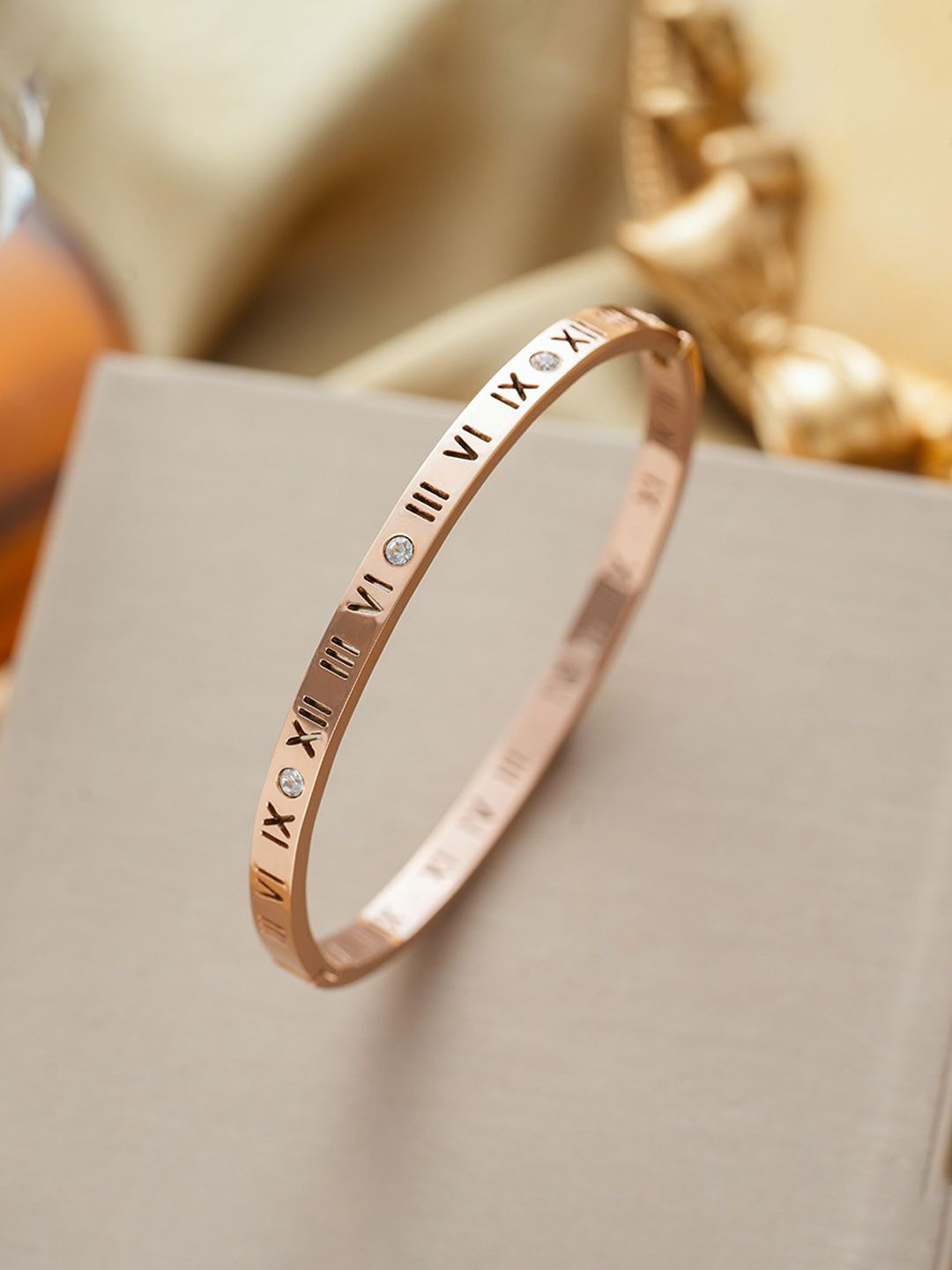 

Designs & You Rose Gold-Plated AD Studded Stainless Steel Anti Tarnish Bracelet