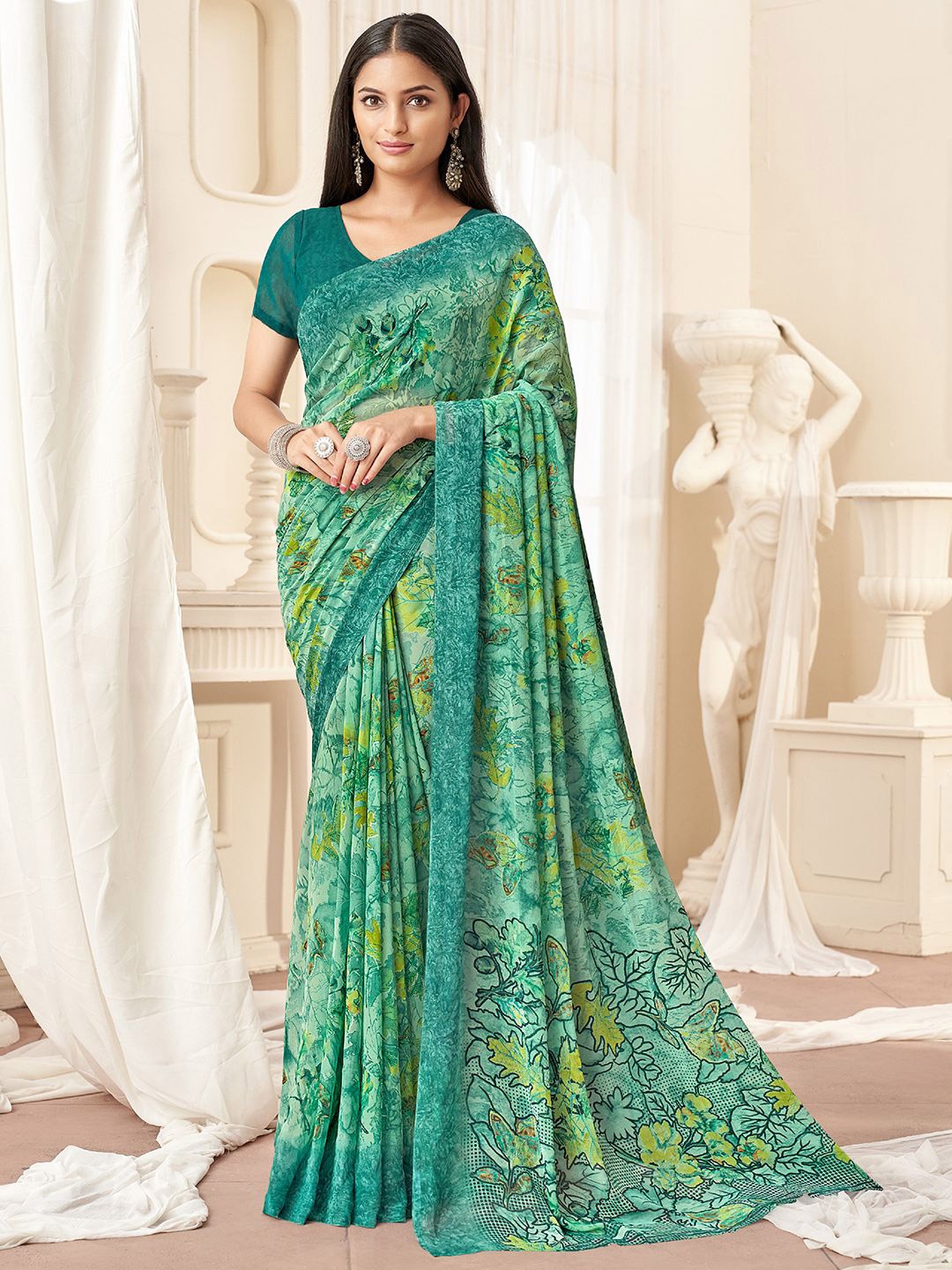 

Mitera Women Floral Printed Georgette Saree, Teal