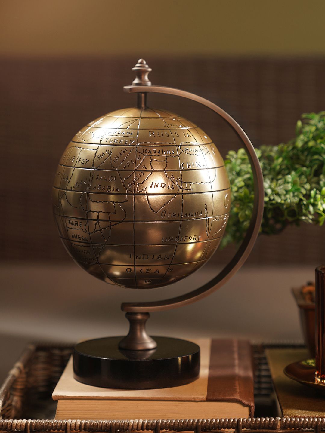 

Pure Home and Living Gold-Toned Decorative Globe with Stand Showpiece