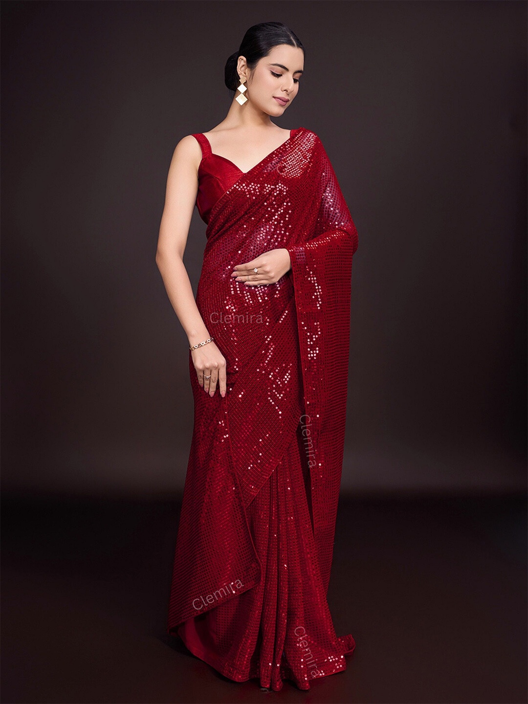 

FashionsEye Embellished Sequinned Pure Georgette Saree, Maroon