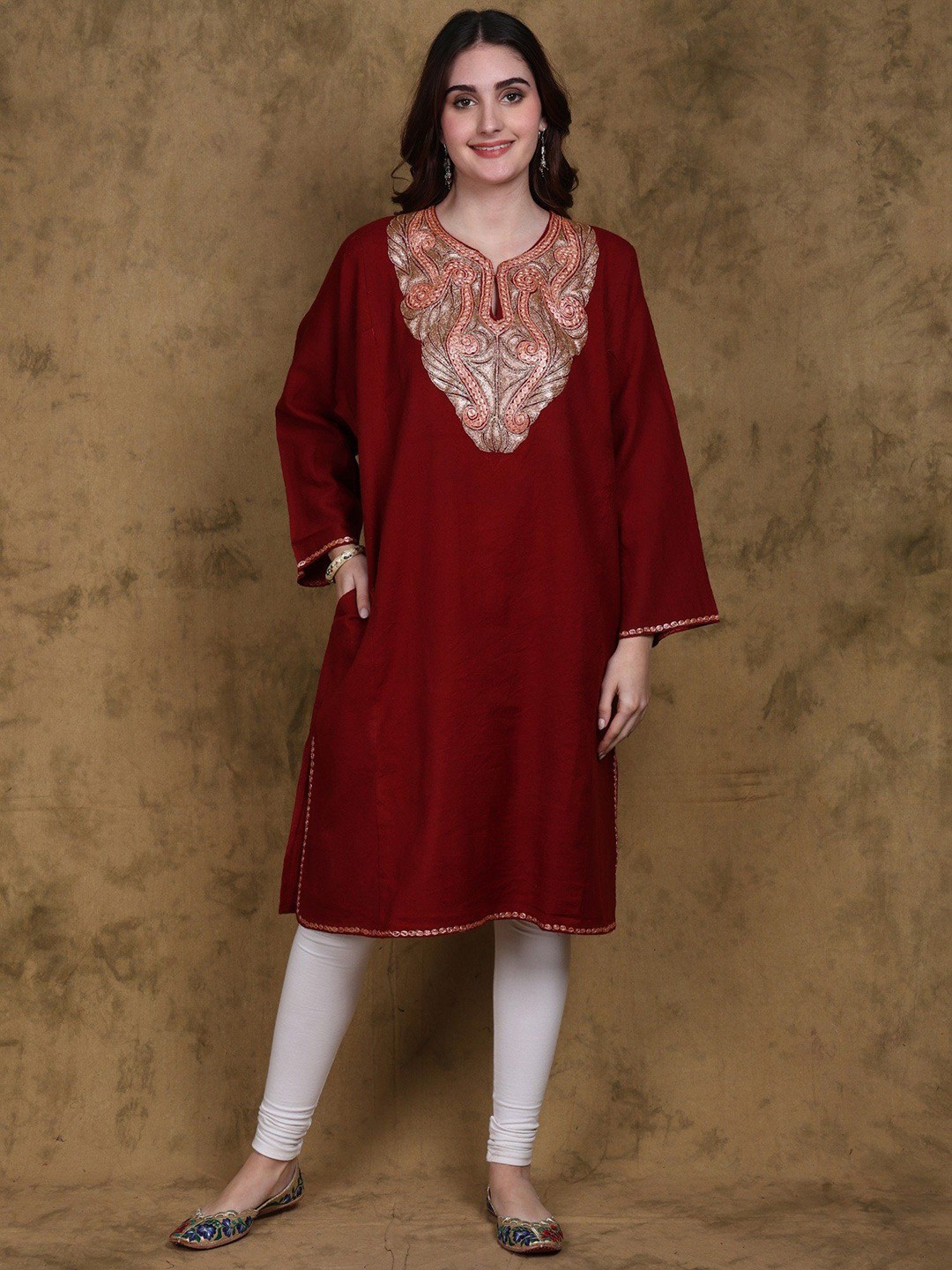 

Exotic India Biking Red Wool Tilla Embroidered Kashmiri Phiran with Side Pockets