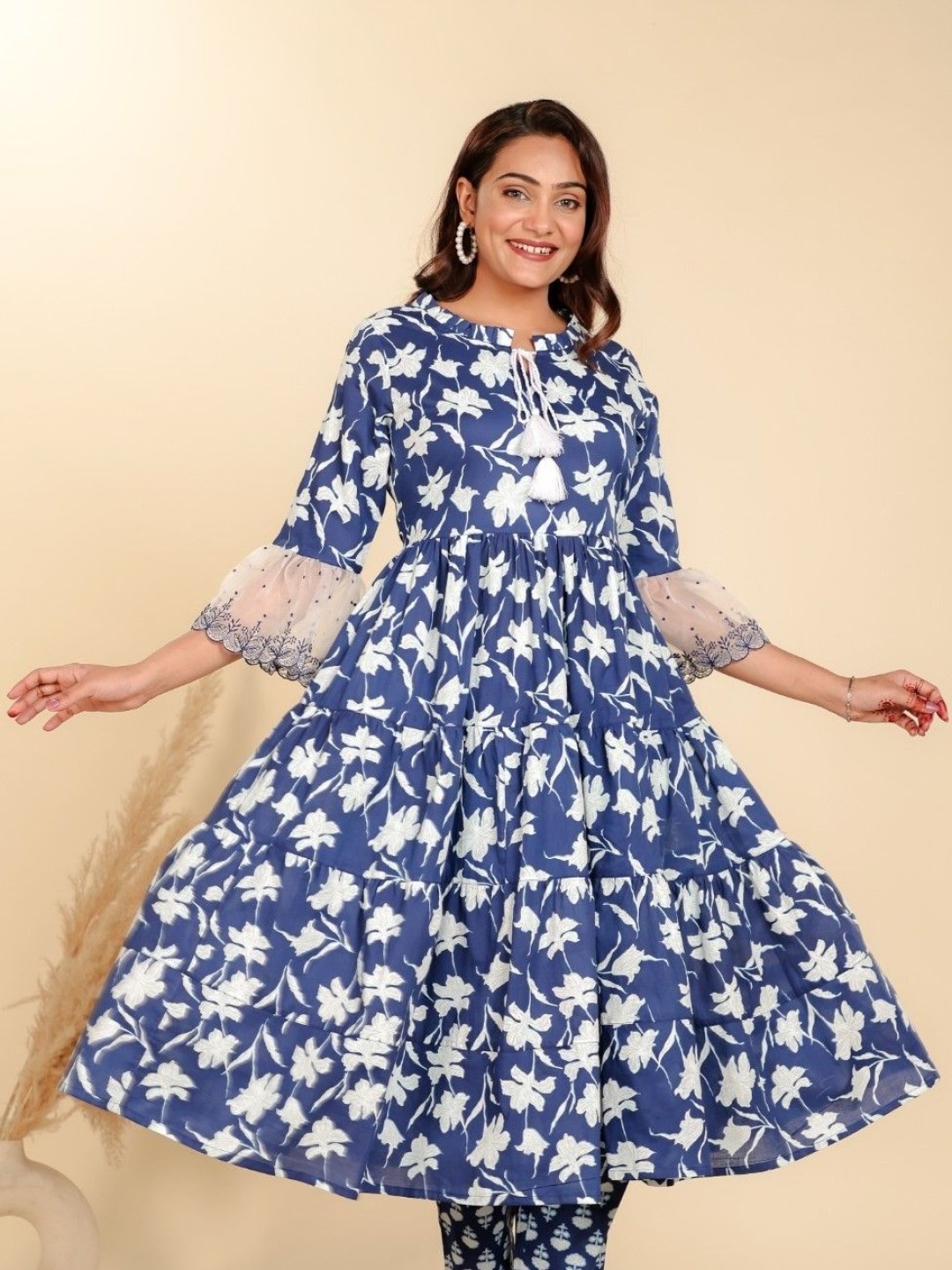 

Aramya Floral Printed Tie-Up Neck Embroidered Anarkali Flared Cotton Kurta, Blue