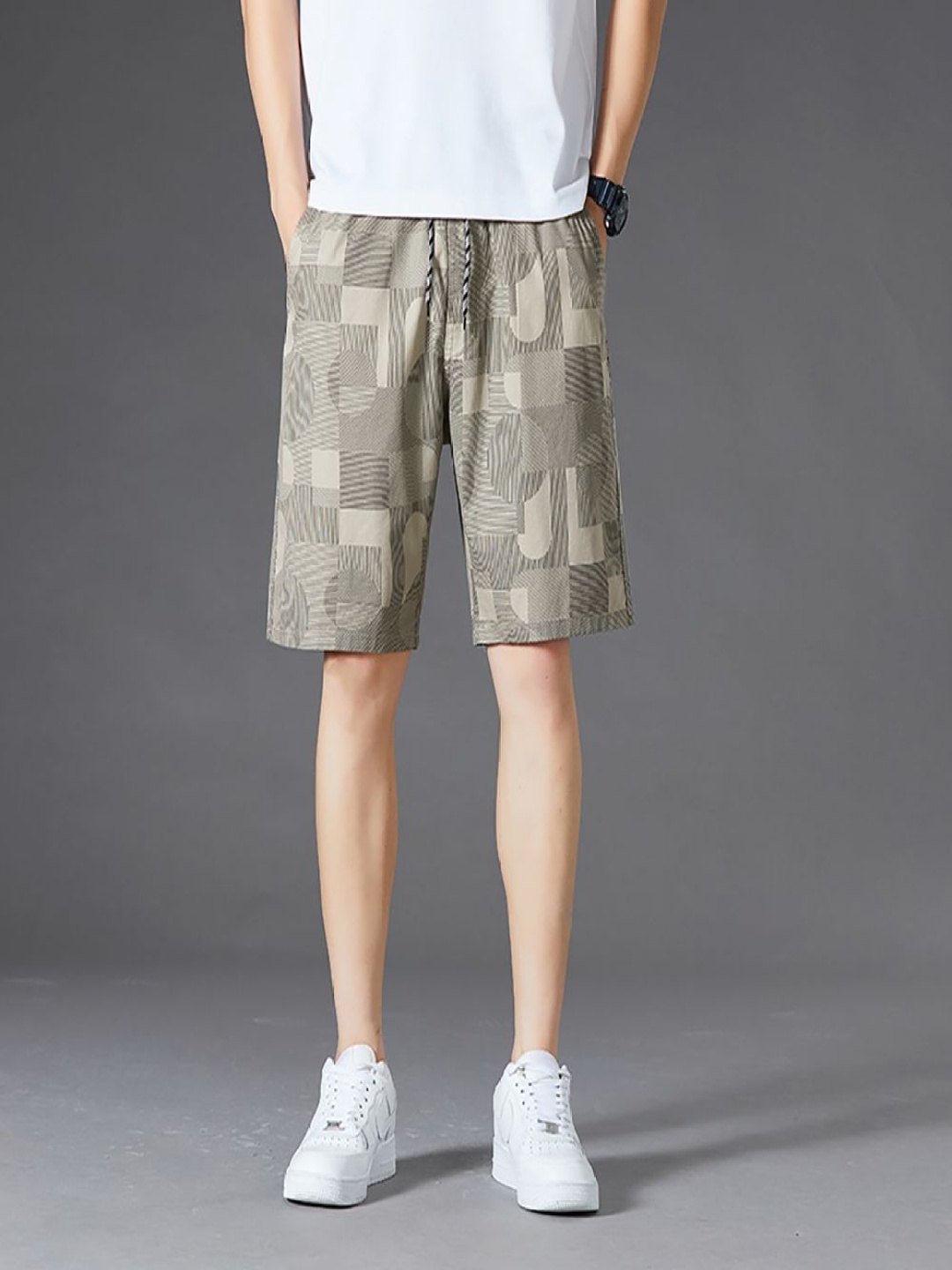 

StyleCast x Revolte Men Printed Mid-Rise Cotton Shorts, Khaki