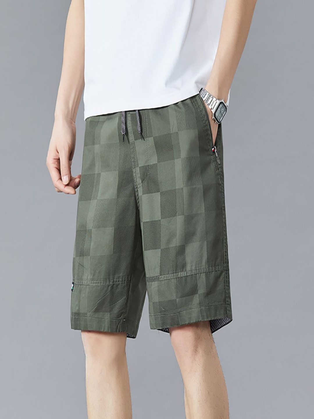 

StyleCast x Revolte Men Cotton Mid-Rise Checked Shorts, Green