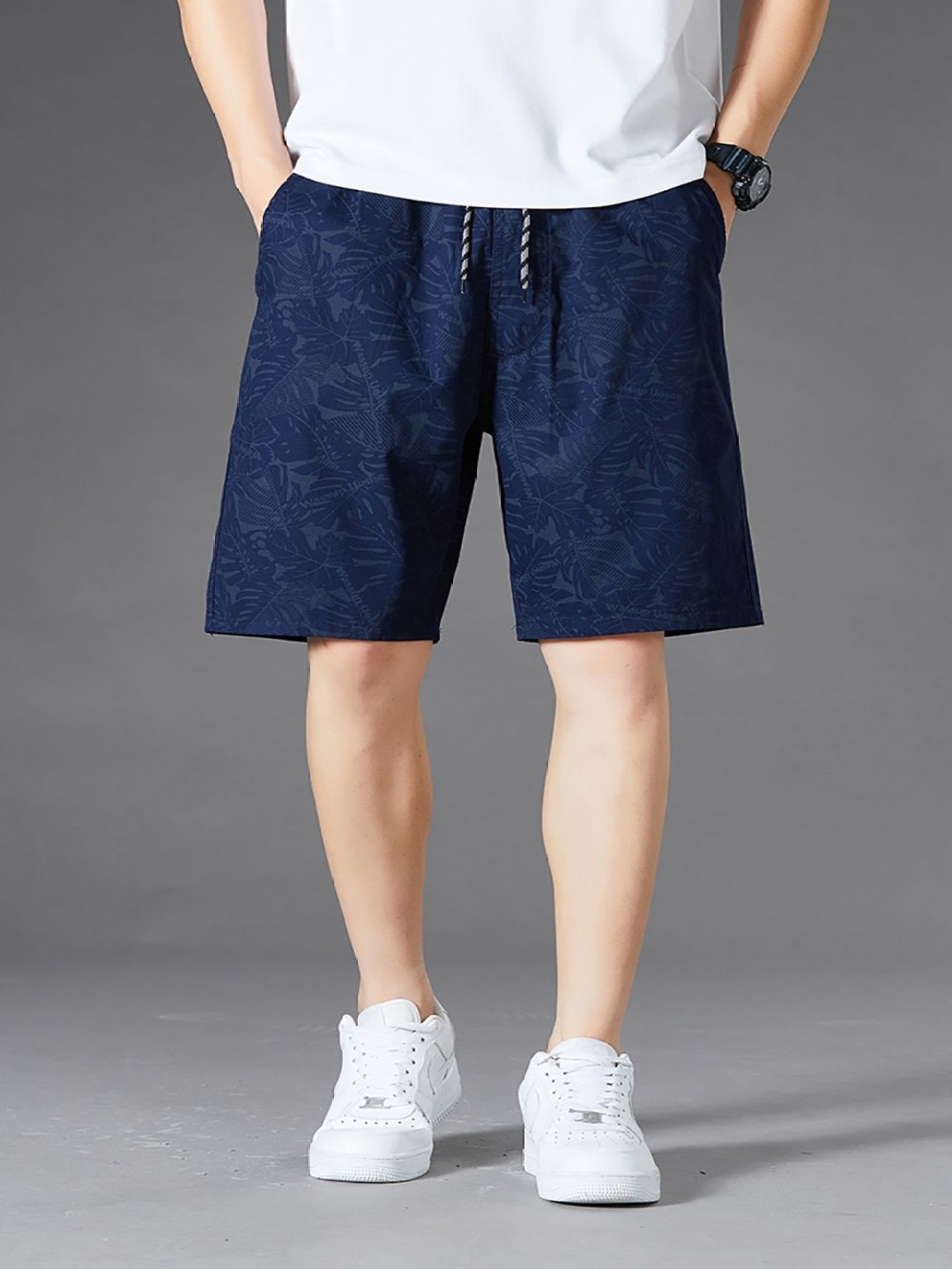 

StyleCast x Revolte Men Conversational Printed Shorts, Navy blue