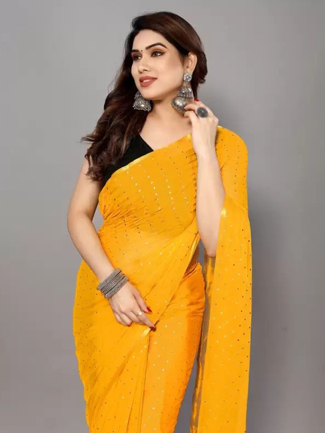 

SAADHVI Embellished Beads and Stones Pure Georgette Saree, Yellow