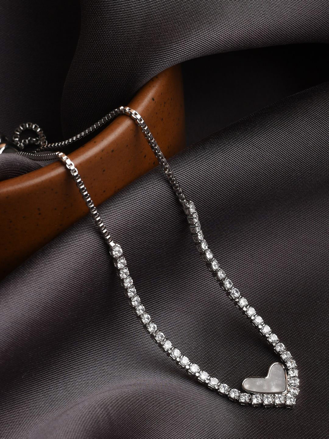 

XPNSV Silver-Plated American Diamond Studded Heart Shaped Charm Bracelet