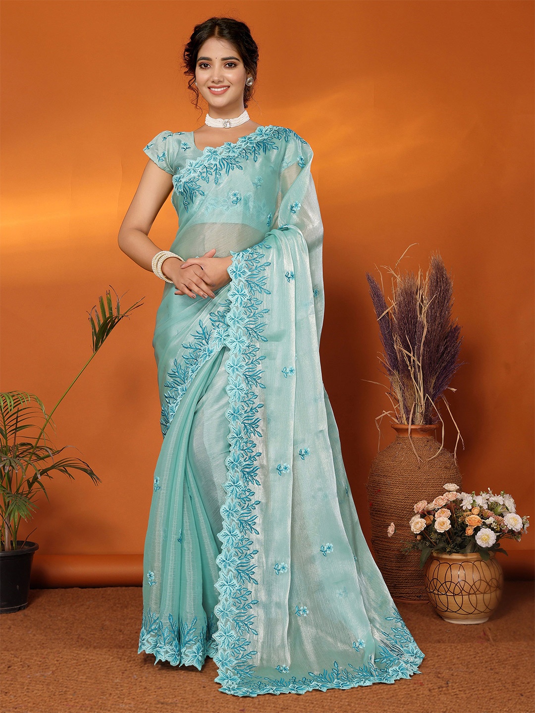 

A.V.M. SILK MILLS Floral Embroidered Saree, Turquoise blue