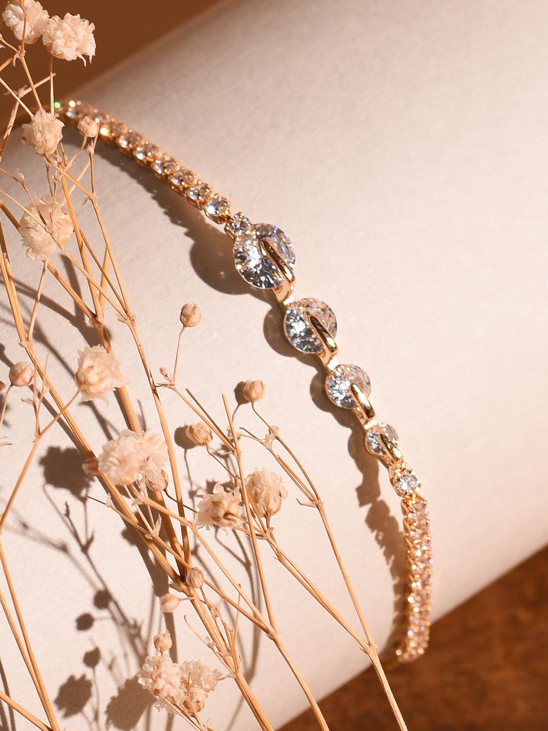 

XPNSV Gold-Plated American Diamond Graduated Studded Charm Bracelet