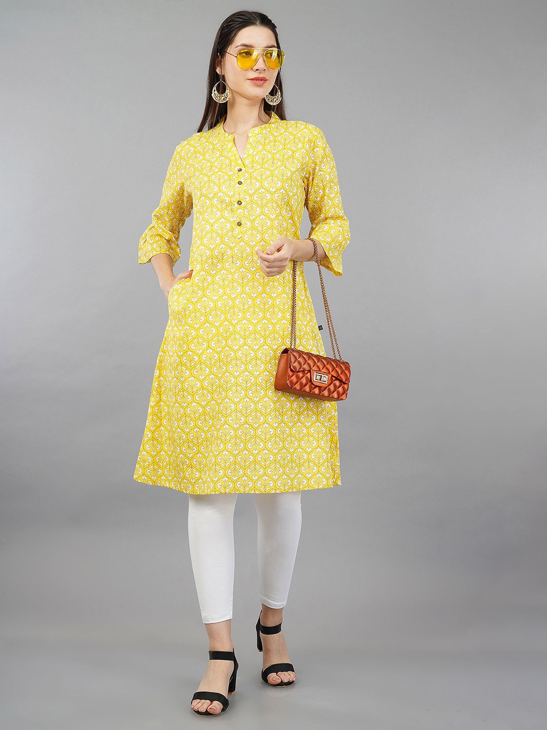 

Avaasa Buy Shruthi Women Floral Printed Bell Sleeves Kurta, Yellow