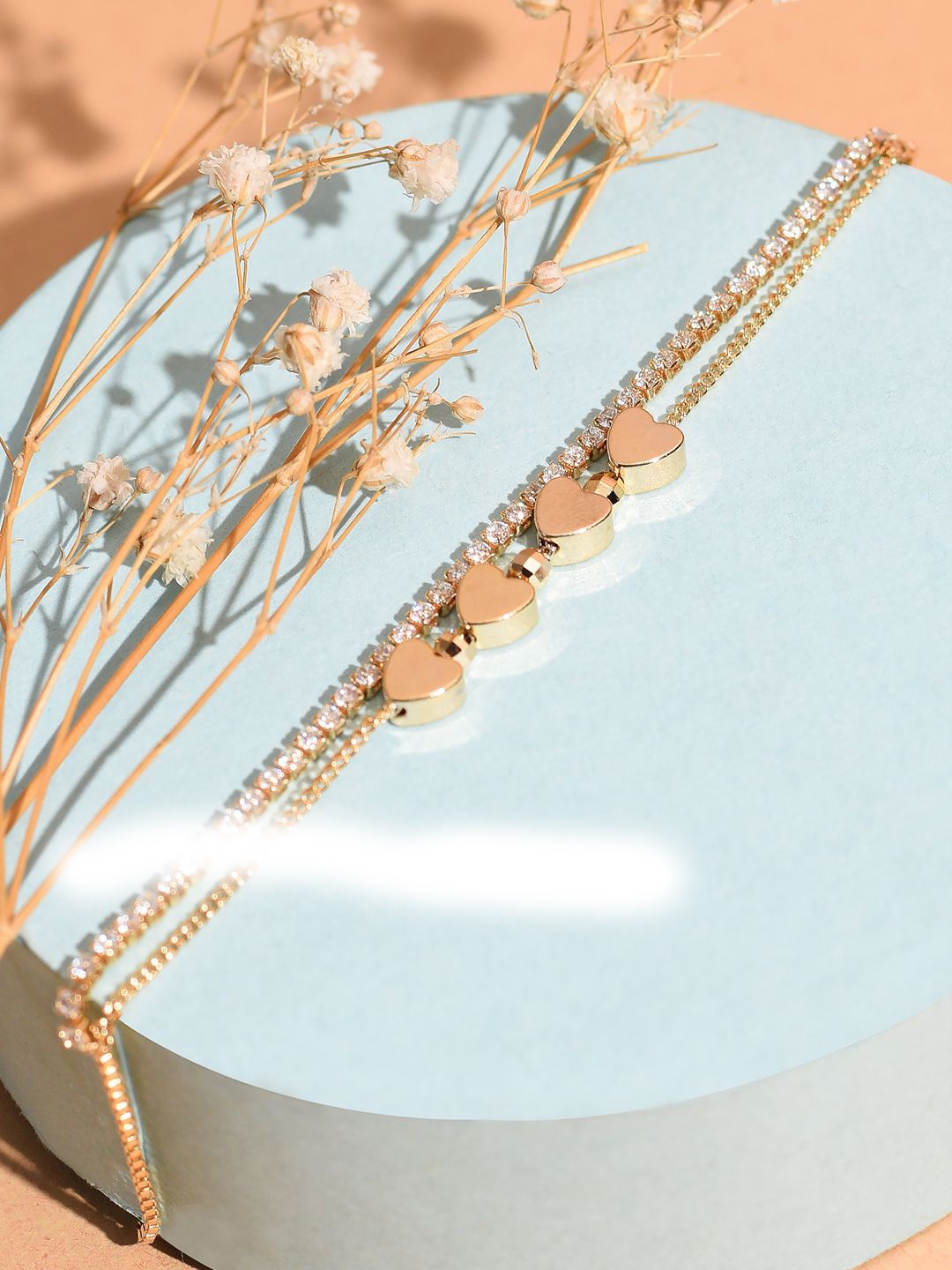 

XPNSV Rose Gold-Plated American Diamond Stone Studded Hearts Charm Bracelet