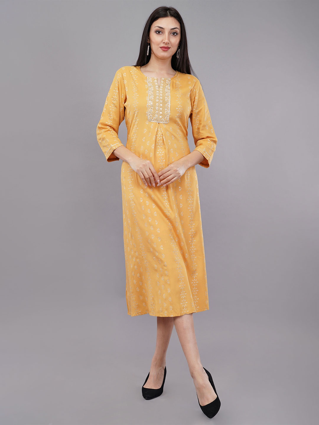 

Avaasa Buy Shruthi Printed A-Line Ethnic Dresses, Yellow