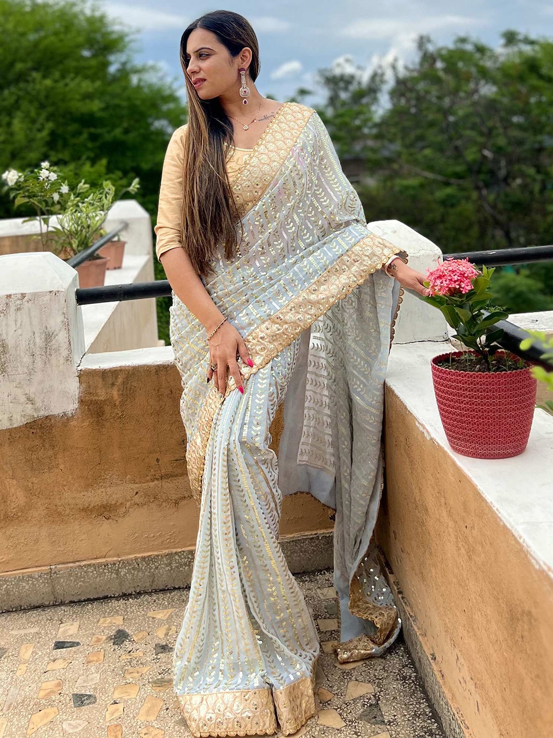 

Peachmode Embellished Sequinned Pure Georgette Saree, Blue