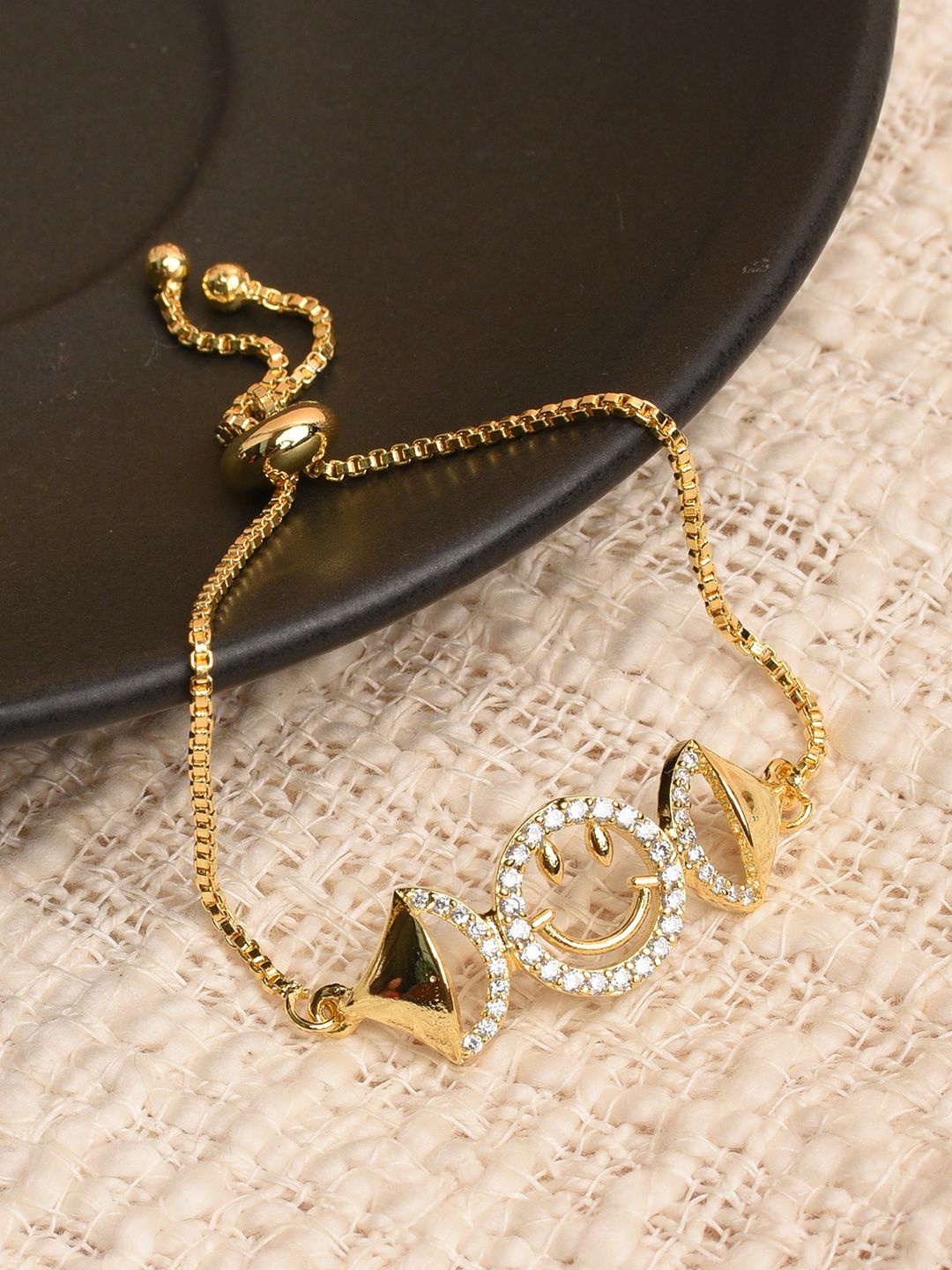 

XPNSV Gold-Plated American Diamond Studded Smiley Charm Bracelet
