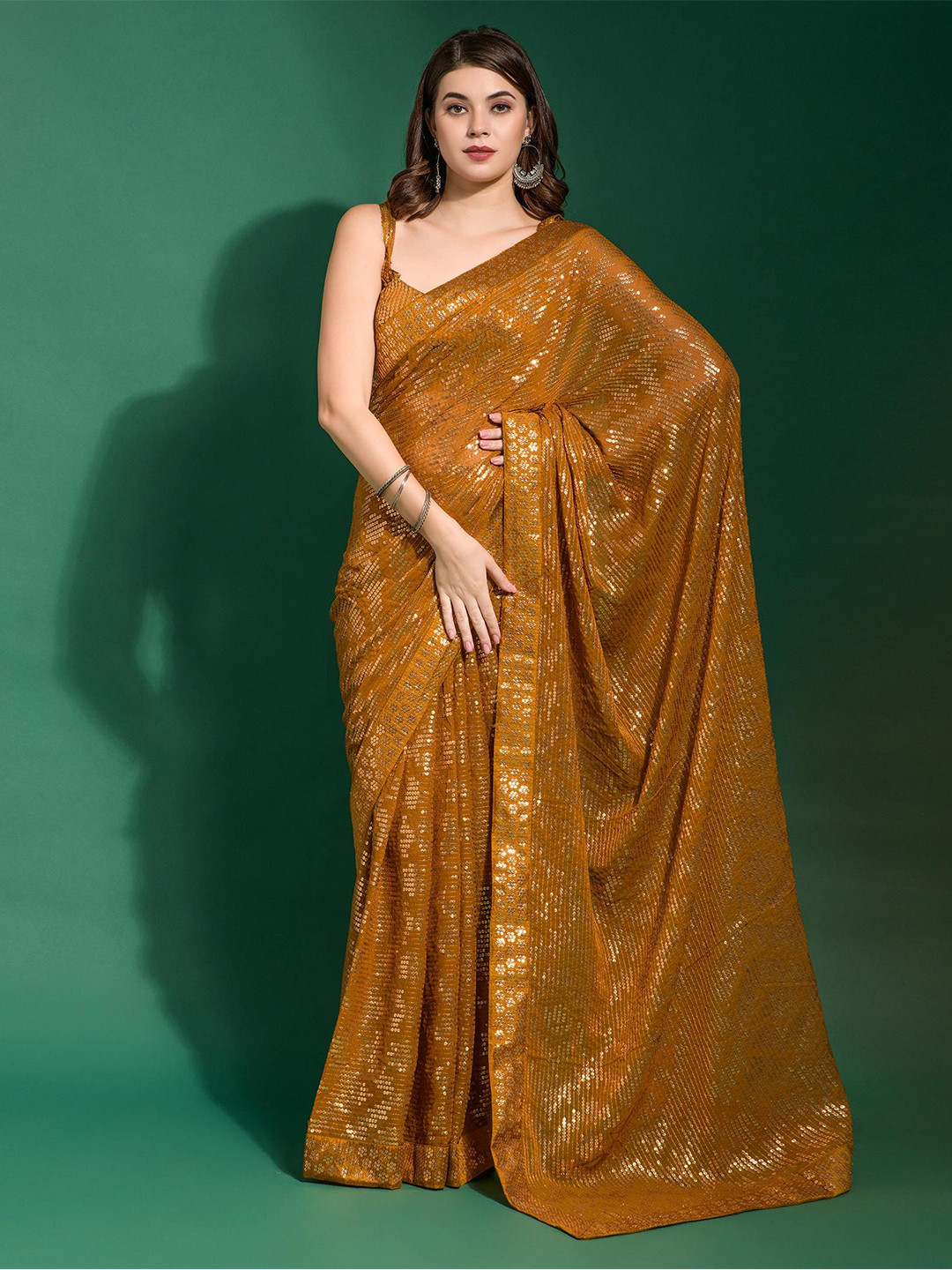 

Peachmode Embellished Sequinned Pure Georgette Saree, Mustard