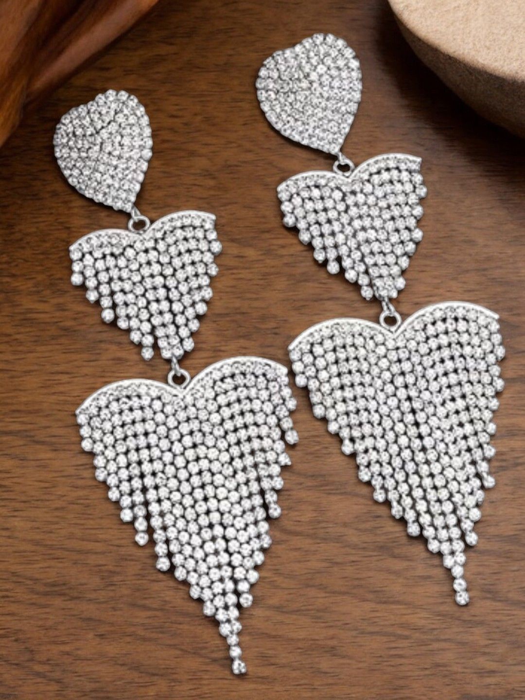 

DressBerry Silver-Studded Crystals Studded Heart Shaped Drop Earrings