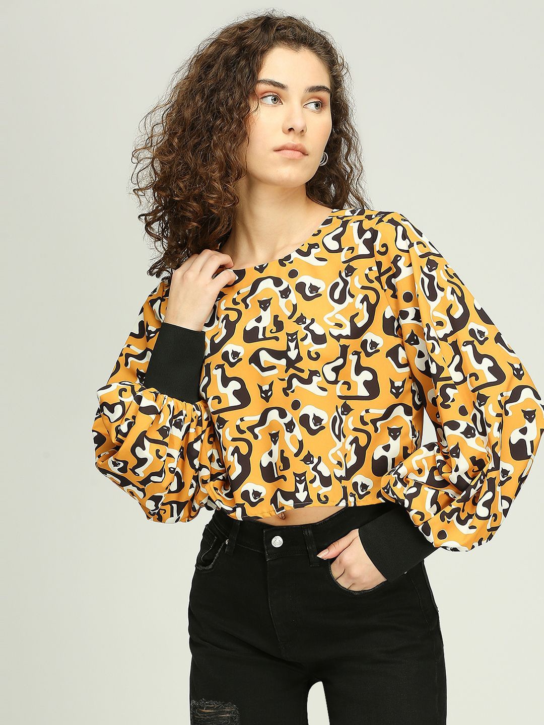 

IZEL Women Animal Printed Cuffed Sleeves Crop Top, Mustard