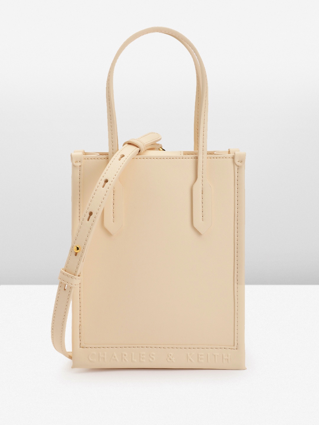 

CHARLES & KEITH Structured Handheld Bag, Beige