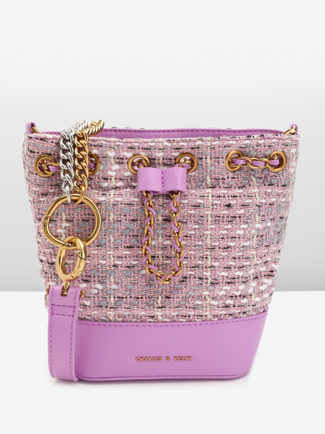 

CHARLES & KEITH Textured Structured Sling Bag, Purple