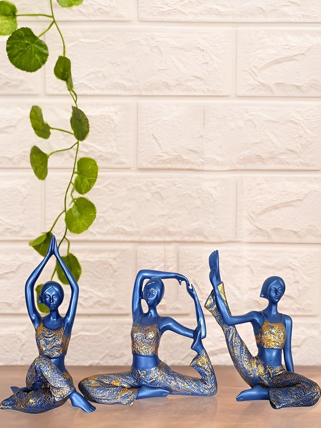 

Zart Blue & Gold Toned 3 Pieces Yoga Lady Figurine Showpiece