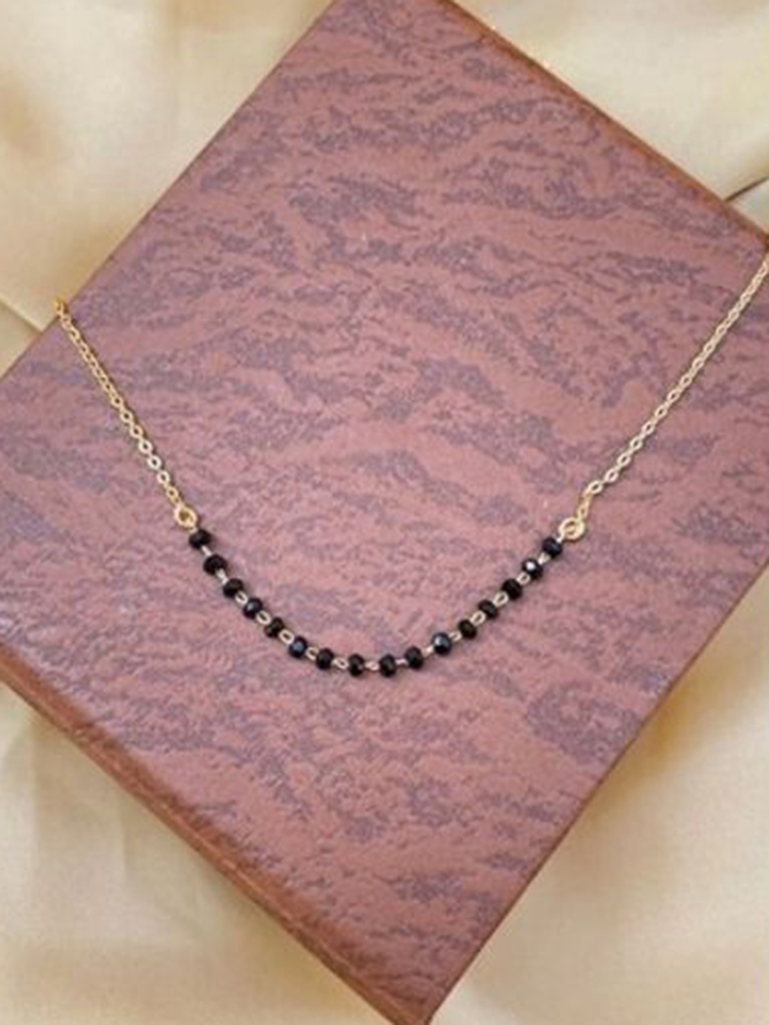 

Wynona Gold-Plated Artificial Stones and Beads Mangalsutra