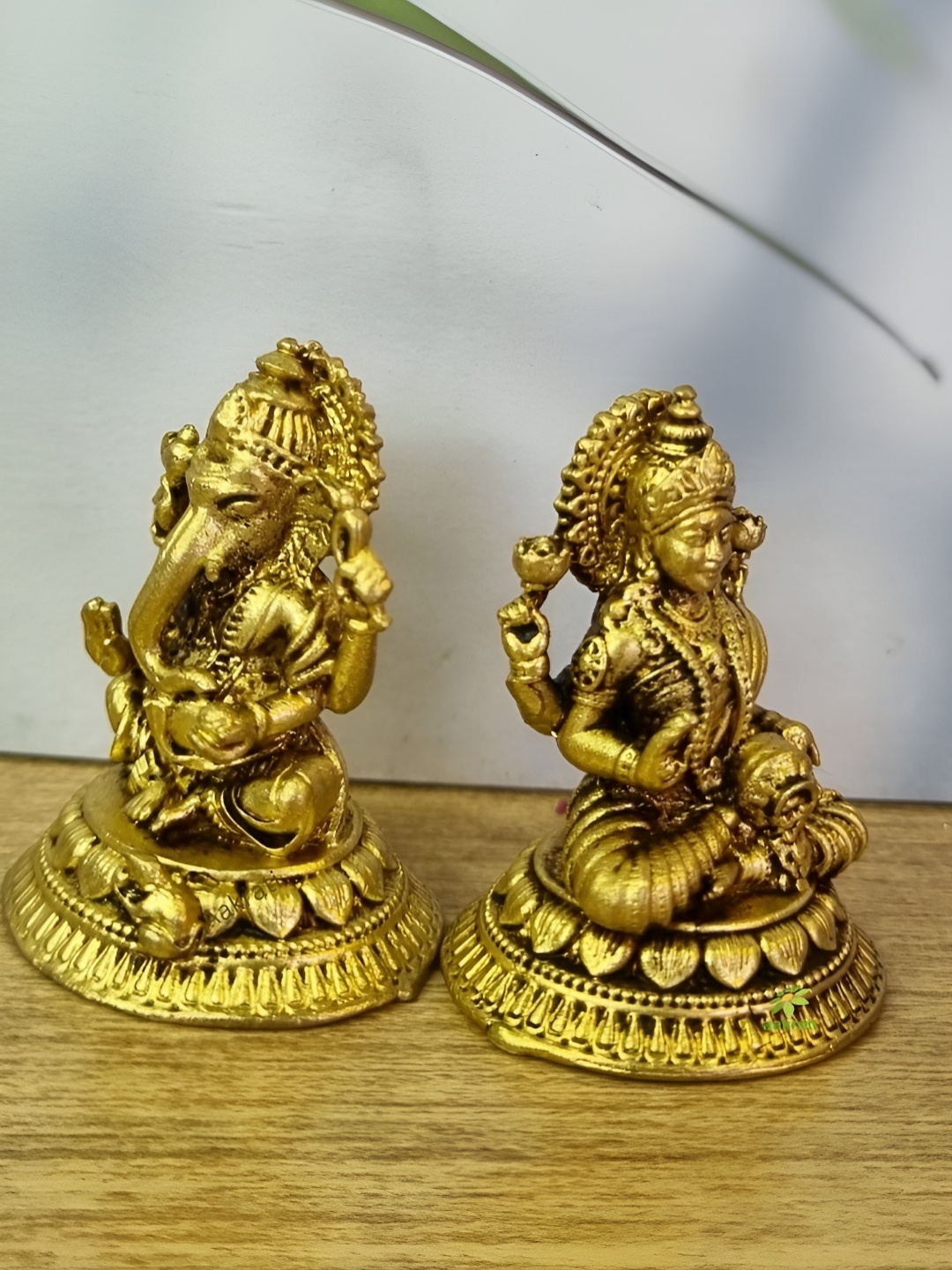 

Aakrati Yellow 2 Pieces Lord Laxmi Ganesh Idol Brass Showpieces